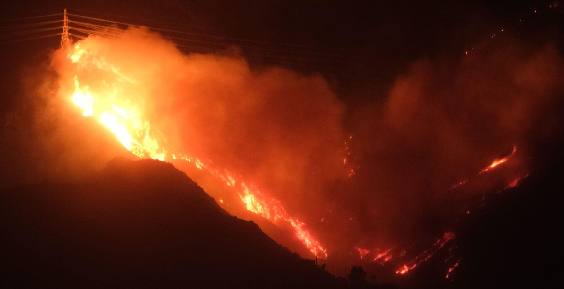 Flaming transmission tower in the Los Angeles hills during the Southern California wildfires of January 2025