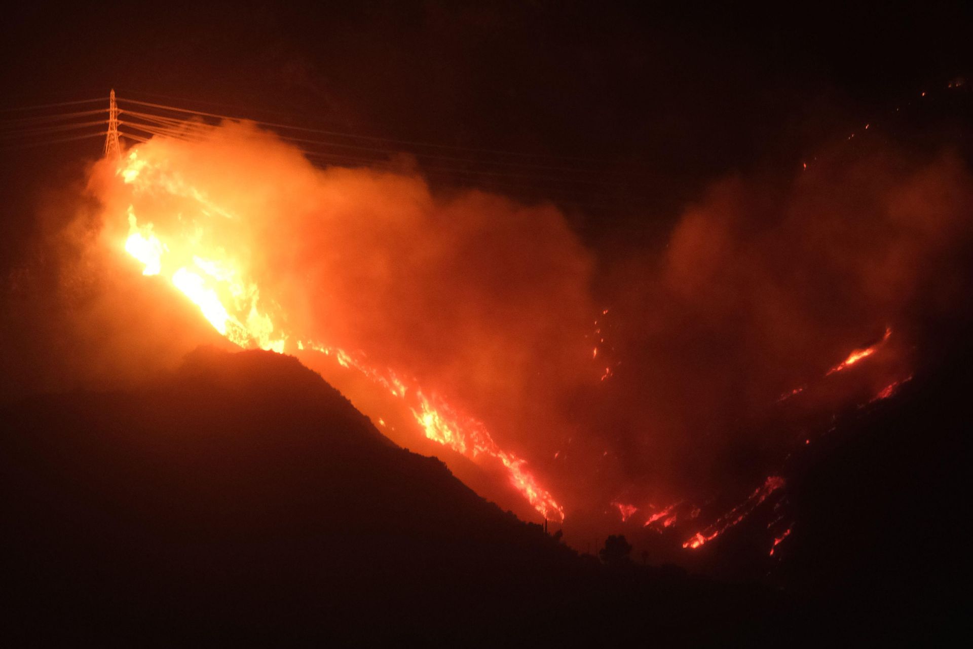 Flaming transmission tower in the Los Angeles hills during the Southern California wildfires of January 2025