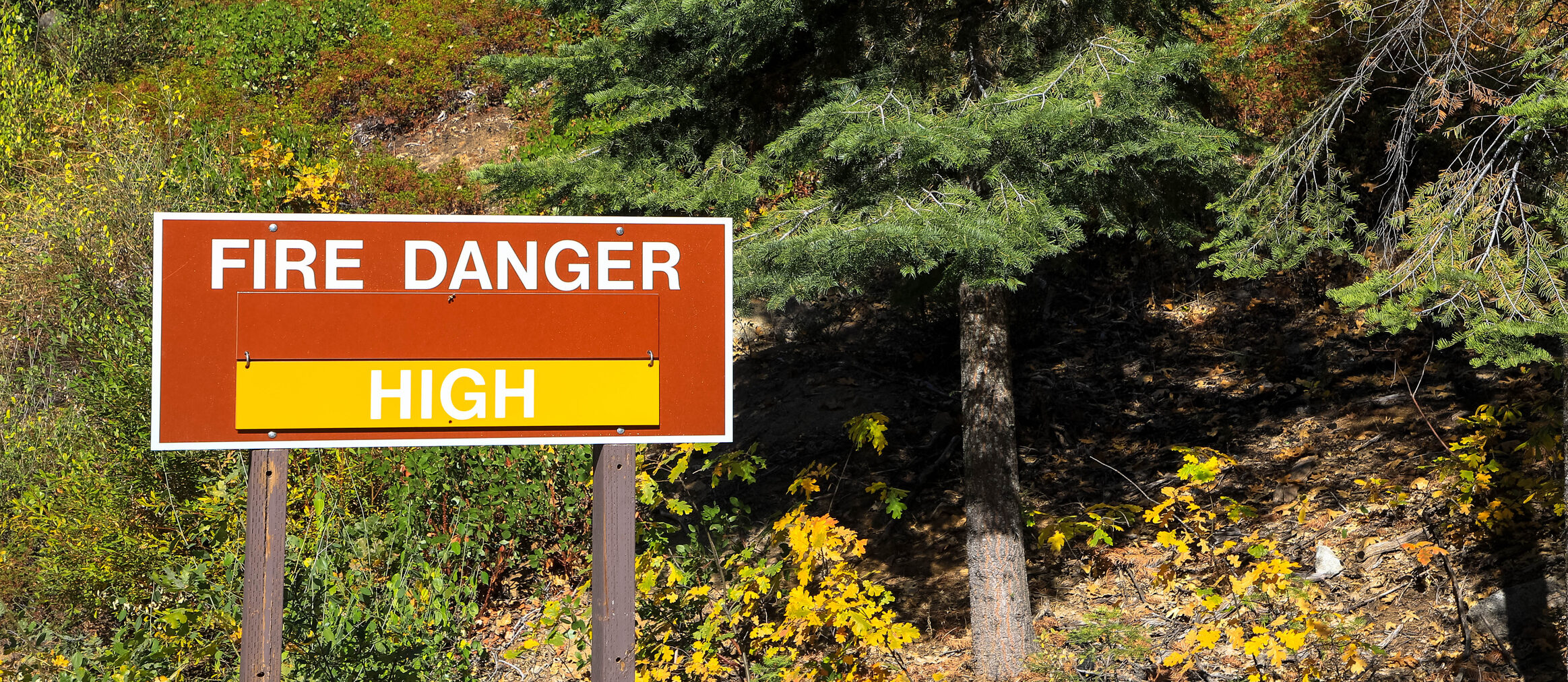 A sign in the Yosemite national park warns residents of the high wildfire danger in summer
