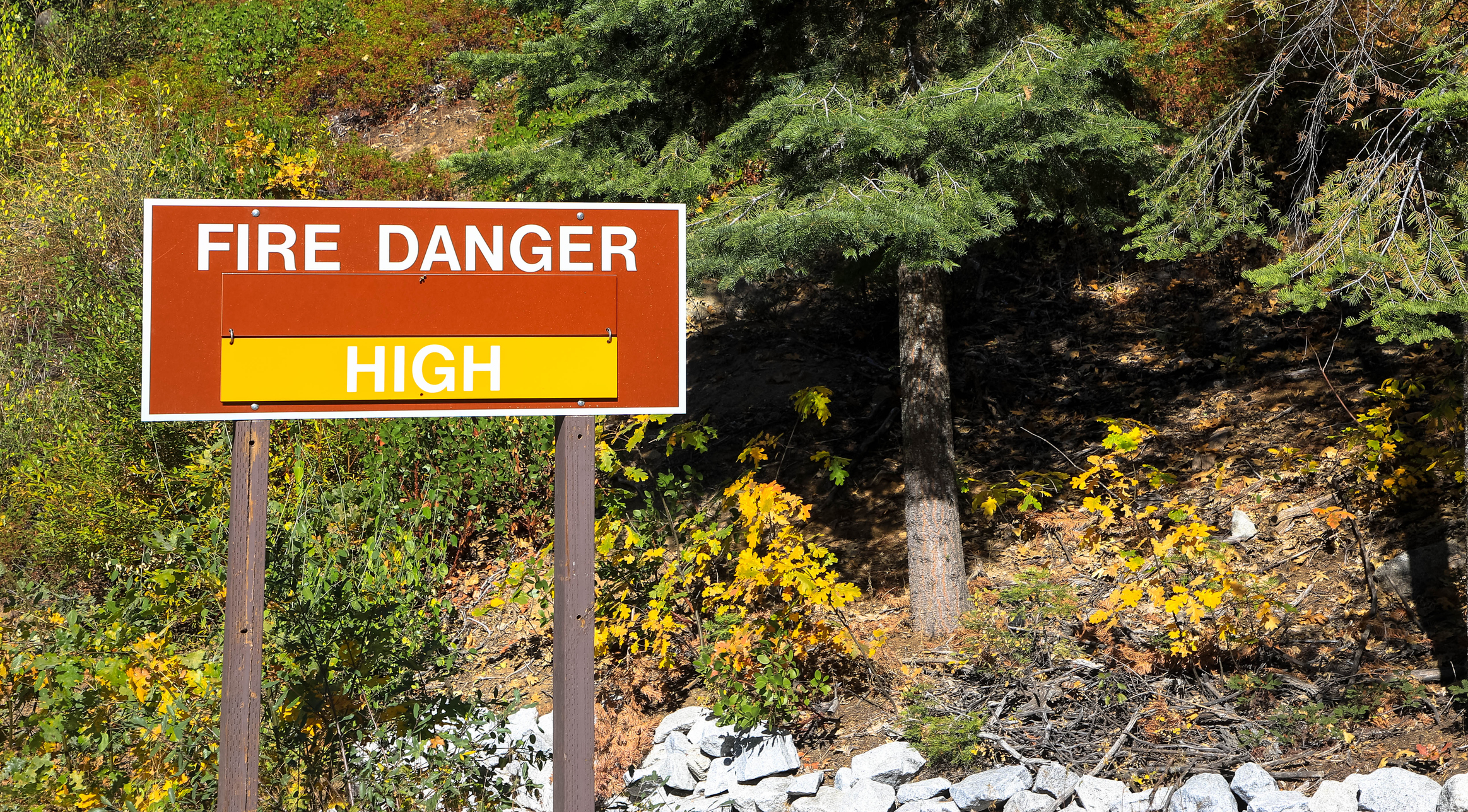 A sign in the Yosemite national park warns residents of the high wildfire danger in summer