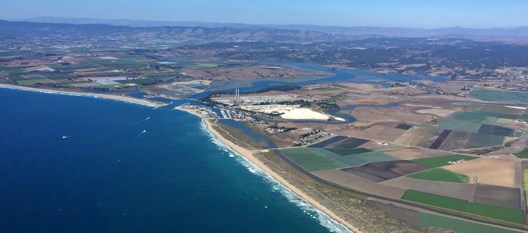 aerial view of moss landing, ca and the power plant