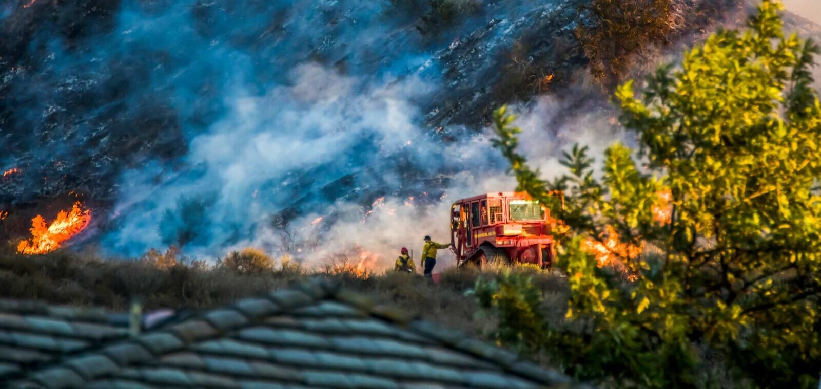 fire on a hill seen from point of view of home