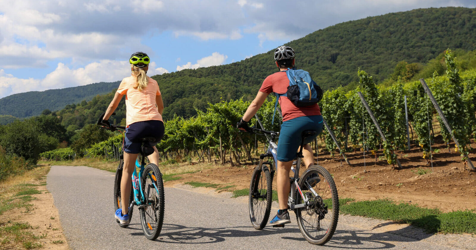 couple bike rides near vineyards